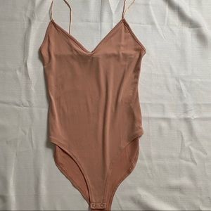 pink bodysuit